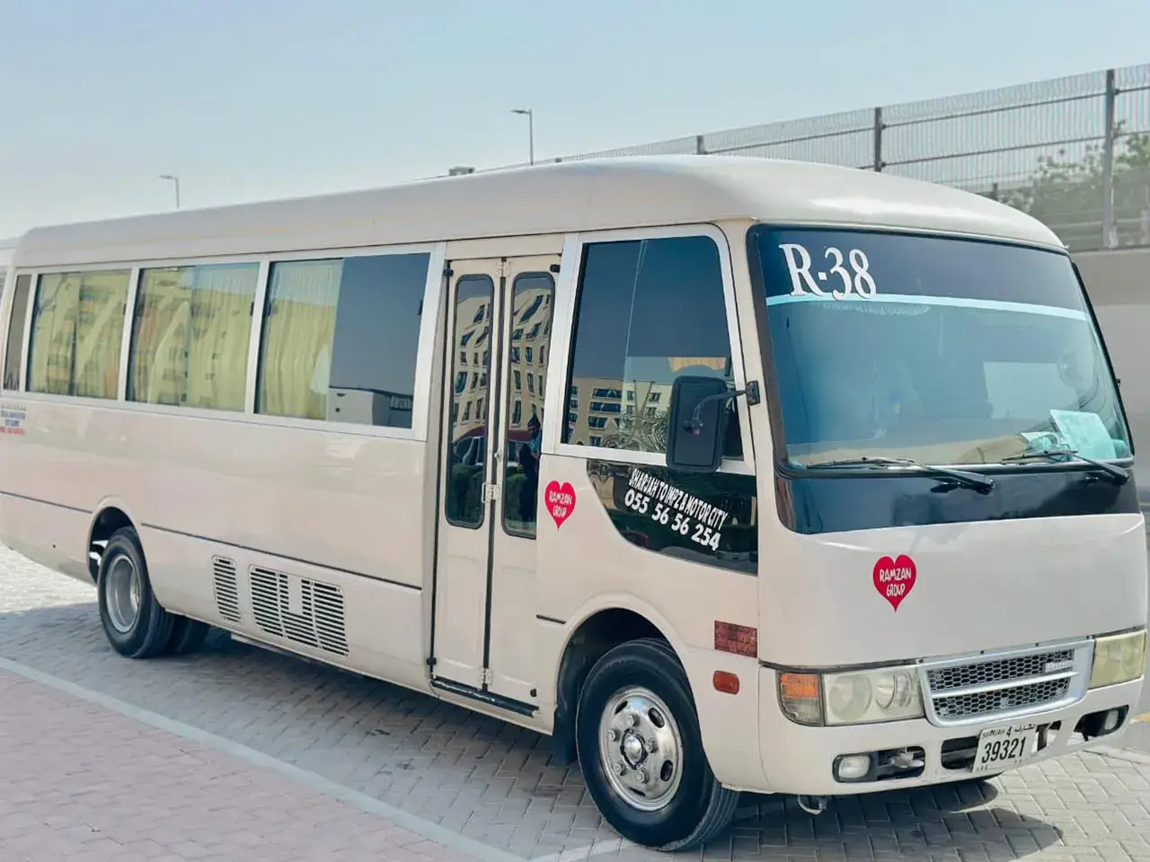 Comfortable Coaster van operated by Ramzan Group fleet