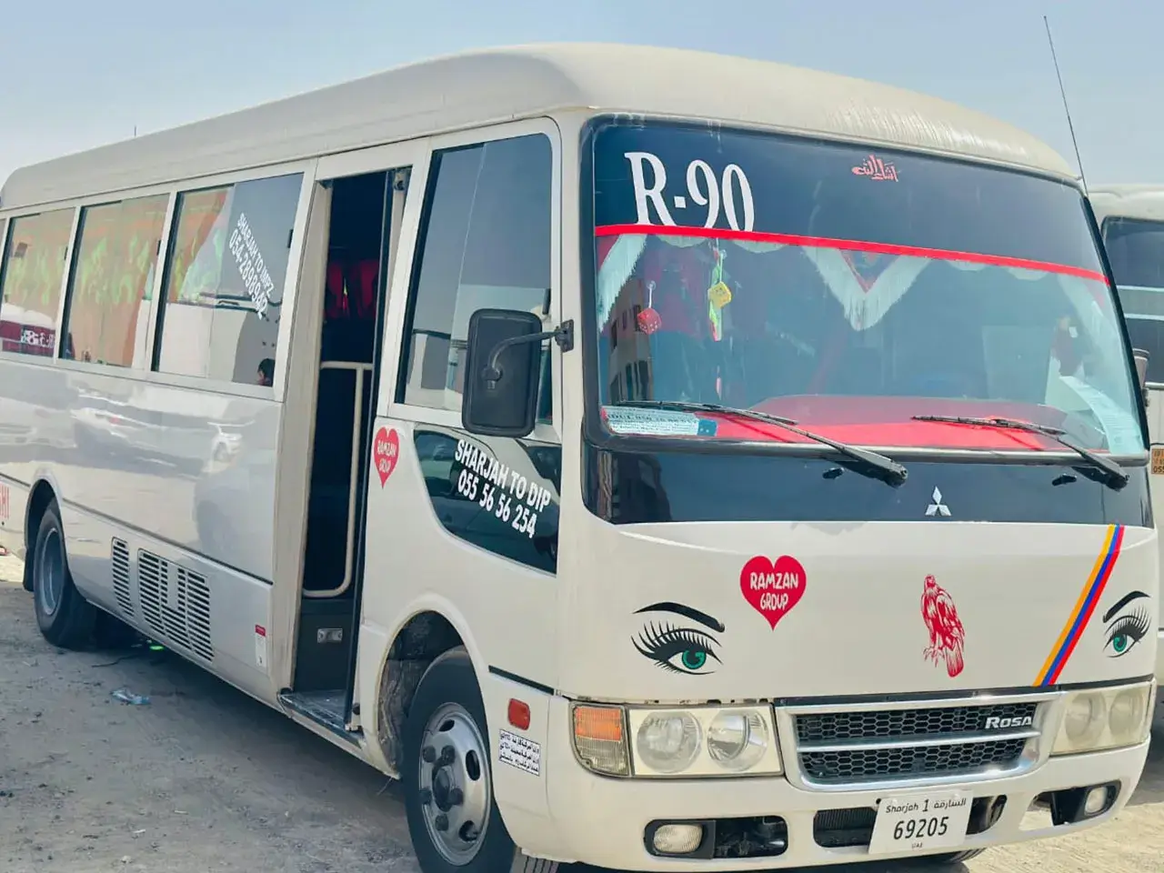 Well-maintained Coaster van from Ramzan Group transport fleet