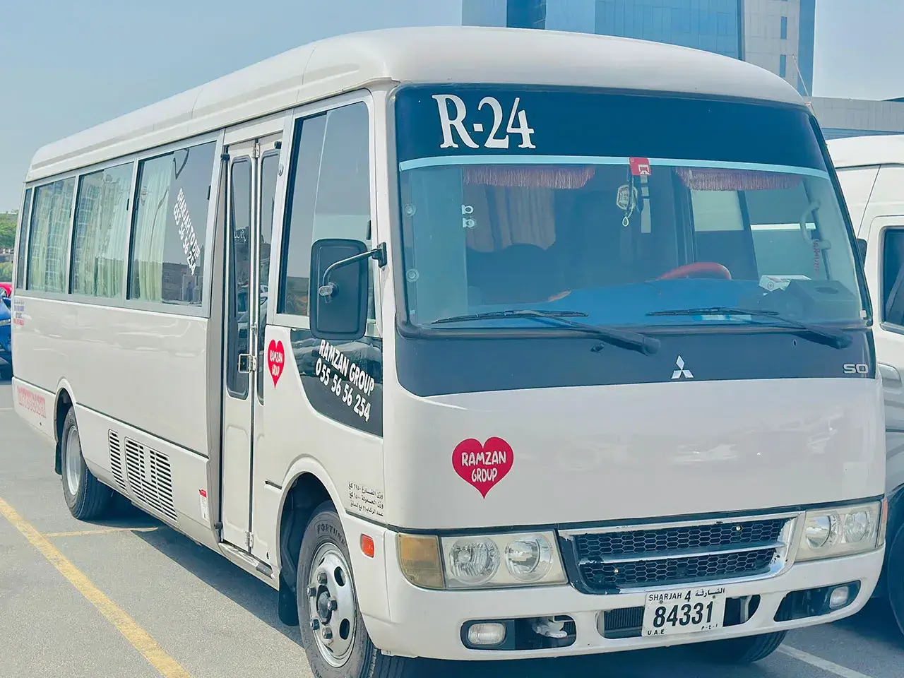 Ramzan Group transport van providing daily Sharjah to Dubai shuttle service